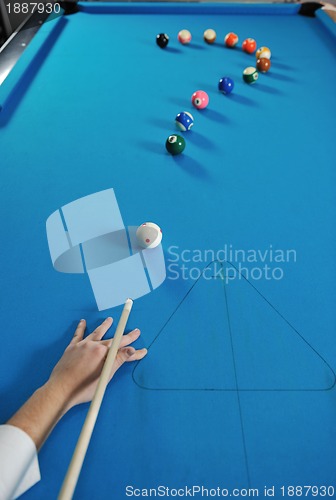 Image of young man play pro billiard game 