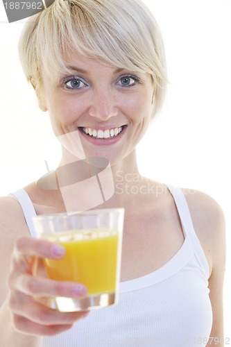 Image of Young woman drinking orange juice isolated over white background