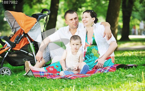 Image of Family at park relaxing and have fun