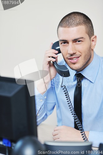 Image of businessman with a headset