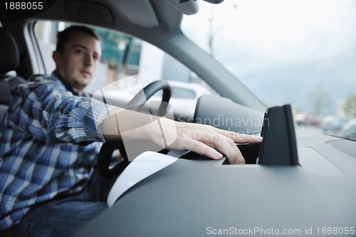 Image of man using car navigation