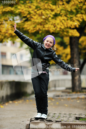 Image of happy girl with umbrella