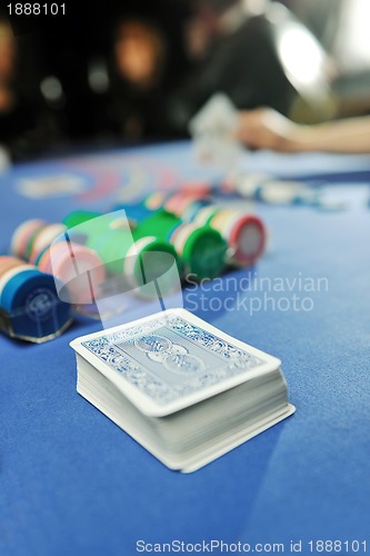 Image of woman play black jack card game in casino