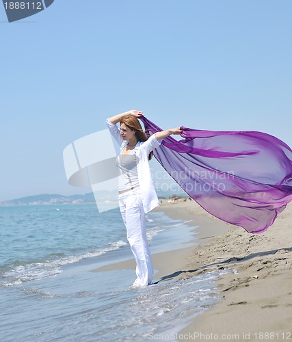 Image of young woman relax  on beach