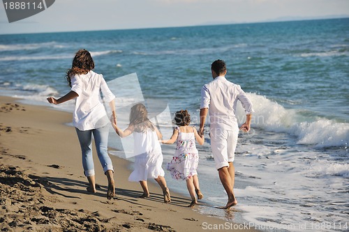 Image of happy young  family have fun on beach
