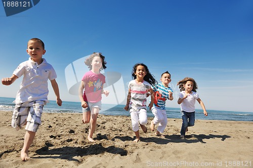 Image of happy young  people group have fun on beach