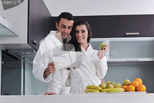 Image of young couple have fun in modern kitchen