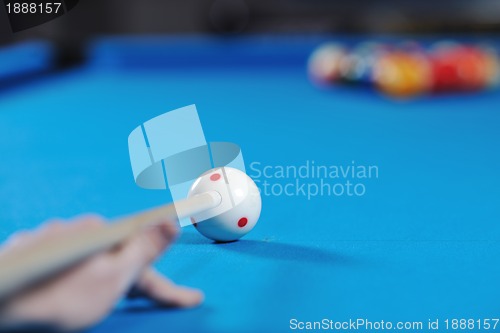 Image of young man play pro billiard game 