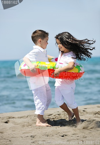 Image of happy young  people group have fun on beach