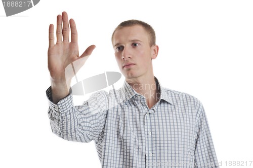 Image of handsome young business man touching screen isolated