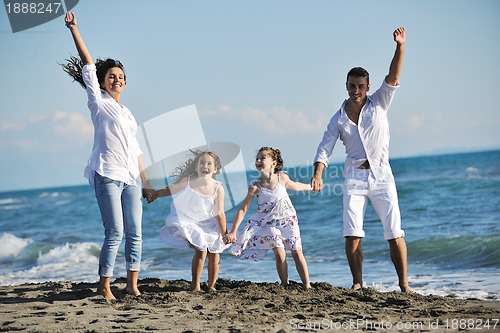 Image of happy young  family have fun on beach