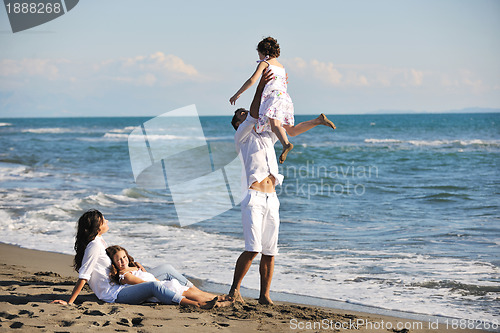 Image of happy young  family have fun on beach