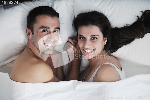 Image of young couple have good time in their bedroom