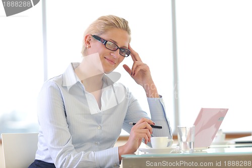 Image of young business woman on meeting