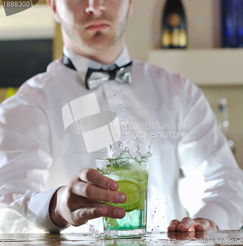 Image of pro barman prepare coctail drink on party