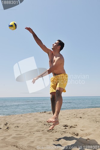 Image of male beach volleyball game player