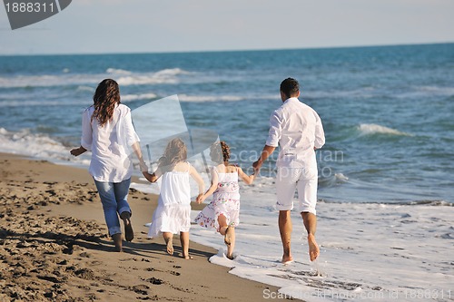 Image of happy young  family have fun on beach