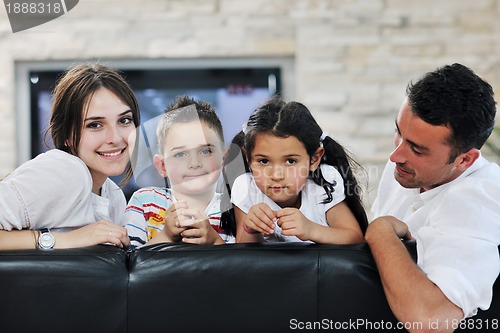 Image of young family at home