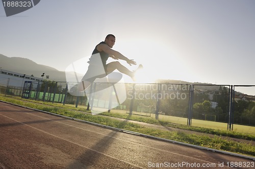 Image of young athlete running