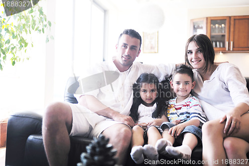 Image of young family at home