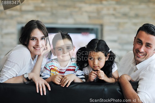 Image of young family at home
