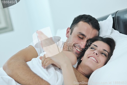 Image of young couple have good time in their bedroom