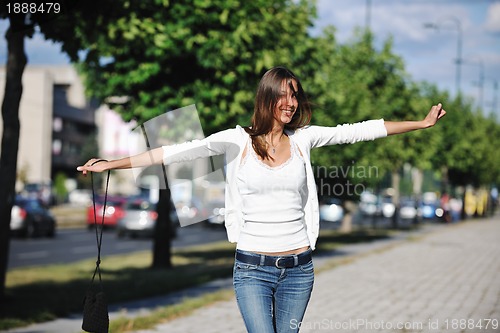 Image of young woman havefun at street 