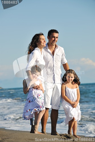 Image of happy young  family have fun on beach