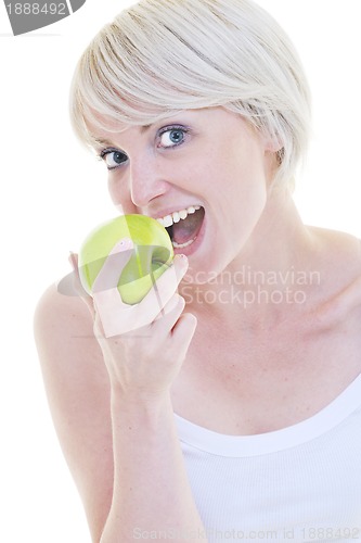 Image of happy  young  woman eat green apple isolated  on white