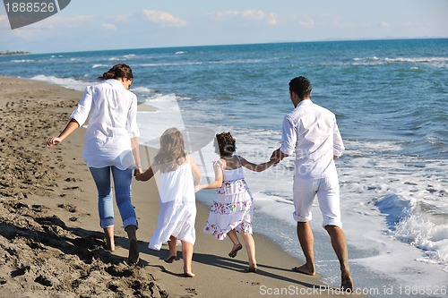 Image of happy young  family have fun on beach