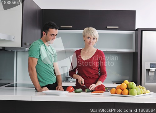 Image of young couple have fun in modern kitchen