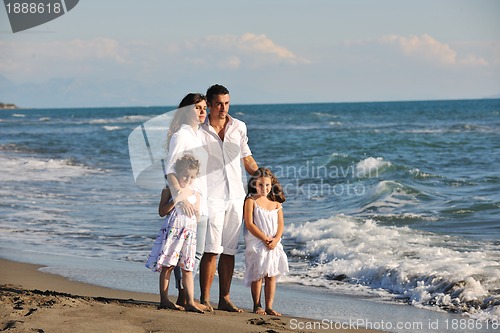 Image of happy young  family have fun on beach