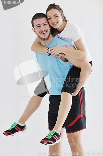 Image of happy young couple fitness workout and fun