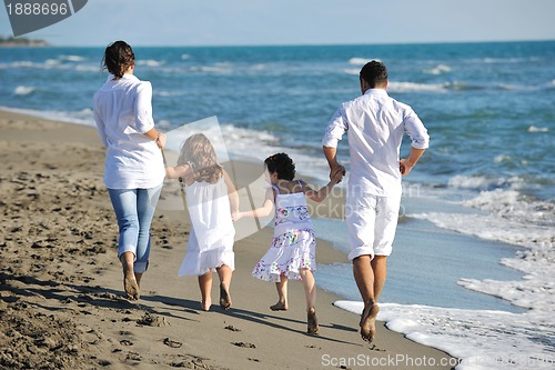 Image of happy young  family have fun on beach