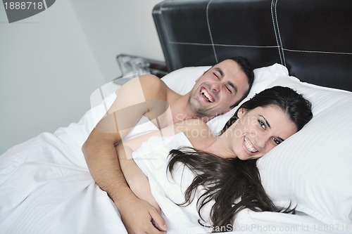 Image of young couple have good time in their bedroom