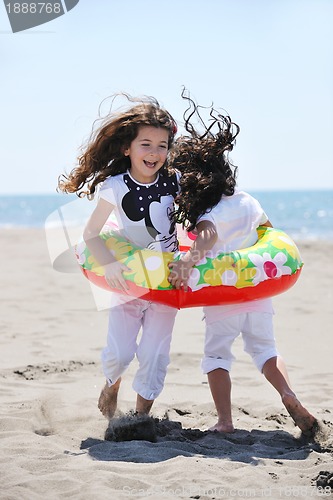 Image of happy young  people group have fun on beach