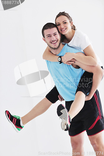 Image of happy young couple fitness workout and fun