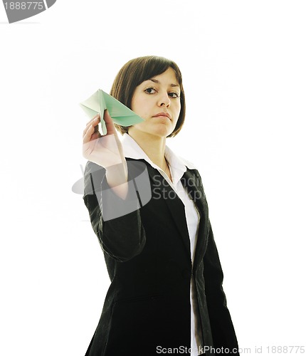 Image of business woman throwing  paper airplane 