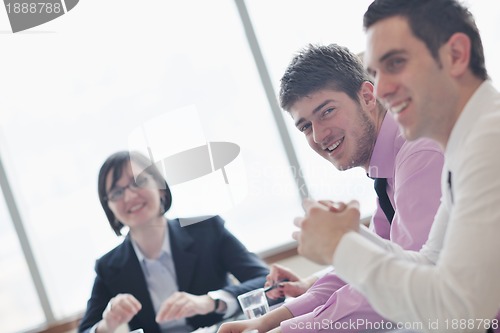 Image of group of business people at meeting