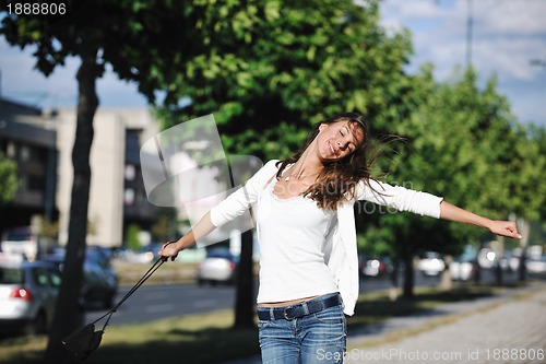 Image of young woman havefun at street 