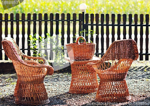 Image of cane furninture and dishes