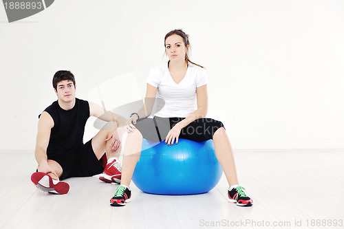 Image of happy young couple fitness workout and fun