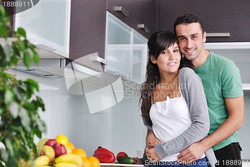 Image of young couple have fun in modern kitchen