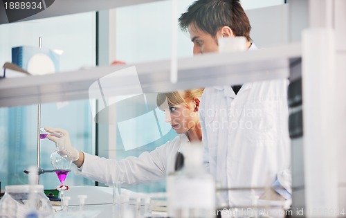 Image of science people in bright lab