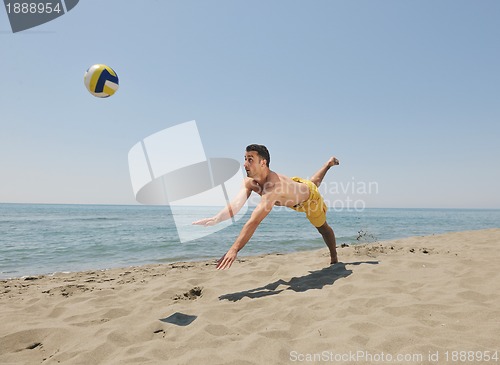Image of male beach volleyball game player