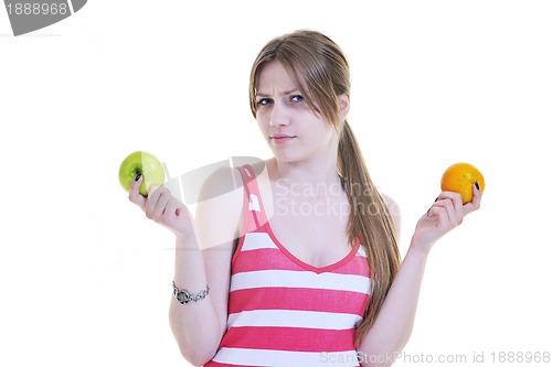 Image of happy  young  woman eat apple isolated  on white