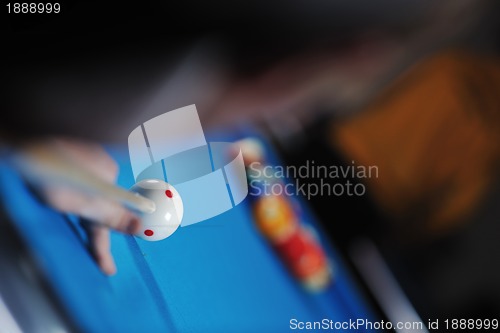 Image of young man play pro billiard game 