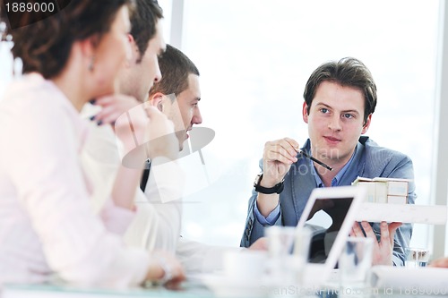 Image of group of business people at meeting