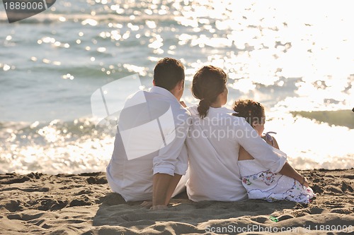 Image of happy young  family have fun on beach