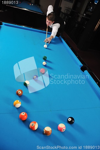 Image of young man play pro billiard game 